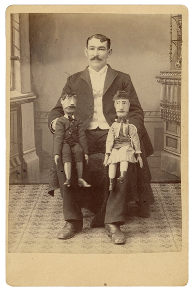  [VENTRILOQUISM]. Cabinet photo of a ventriloquist. Circa 19...