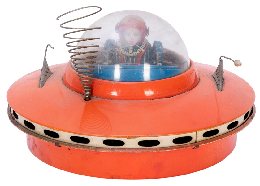  Flying Saucer with Space Pilot Battery-Operated Toy. Japan:...