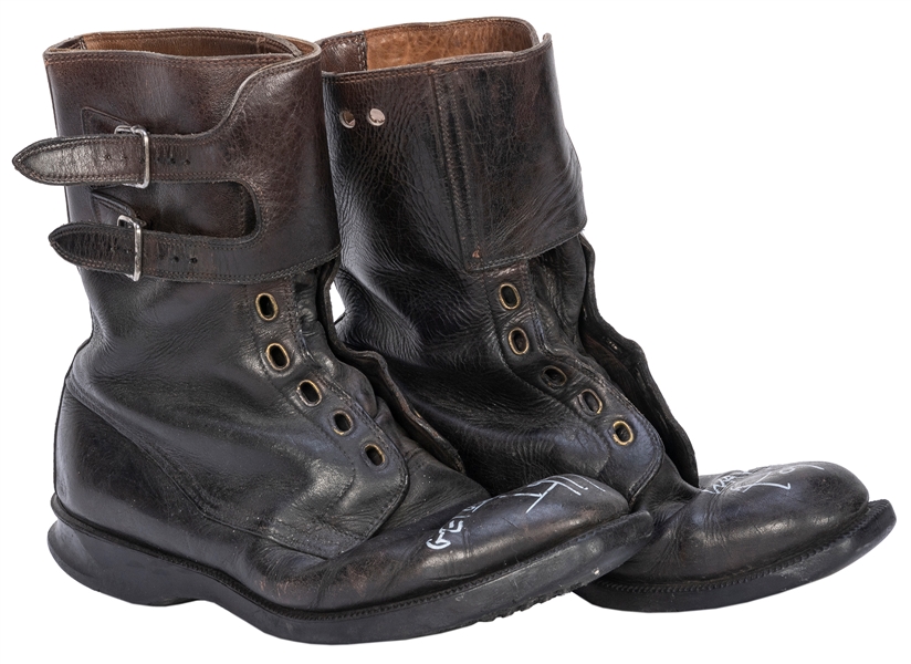  [POP, Iggy (b. 1947)]. Pair of Boots Inscribed by Iggy Pop....