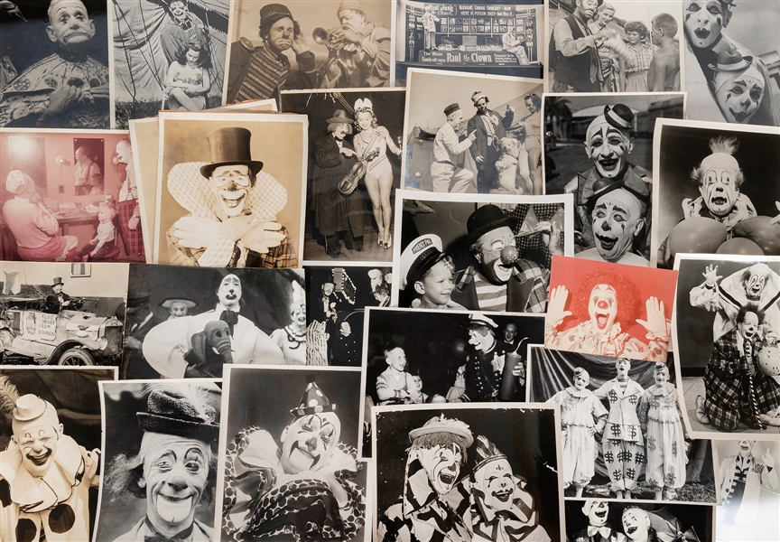  [CLOWNS]. Collection of circus clown photographs. Bulk mid-...