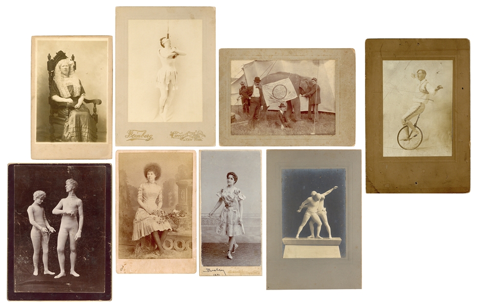  Eight circus performer cabinet photographs. American, ca. 1...