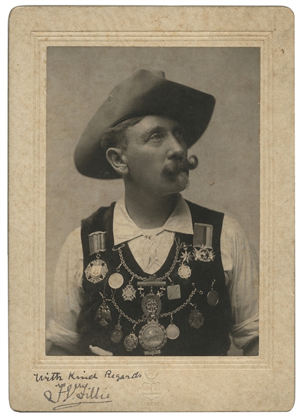  Signed cabinet photo of a Wild West performer. New York: Sc...