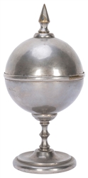  MINIATURE CANNONBALL VASE. Circa 1895. A small cannonball i...