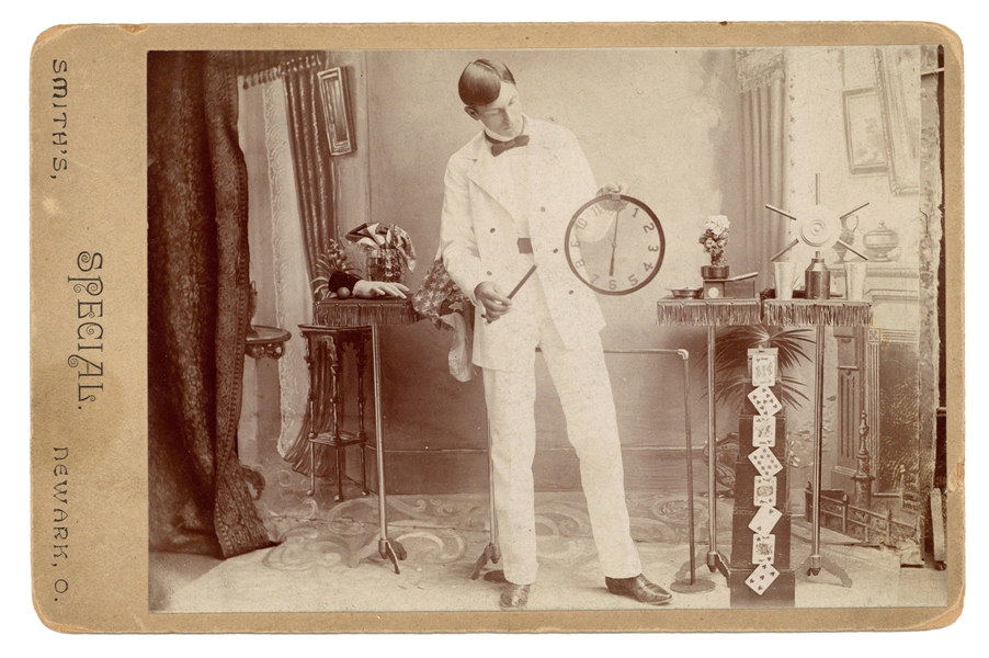  Photograph of a Magician and his Props. Newark, OH: Smiths,...