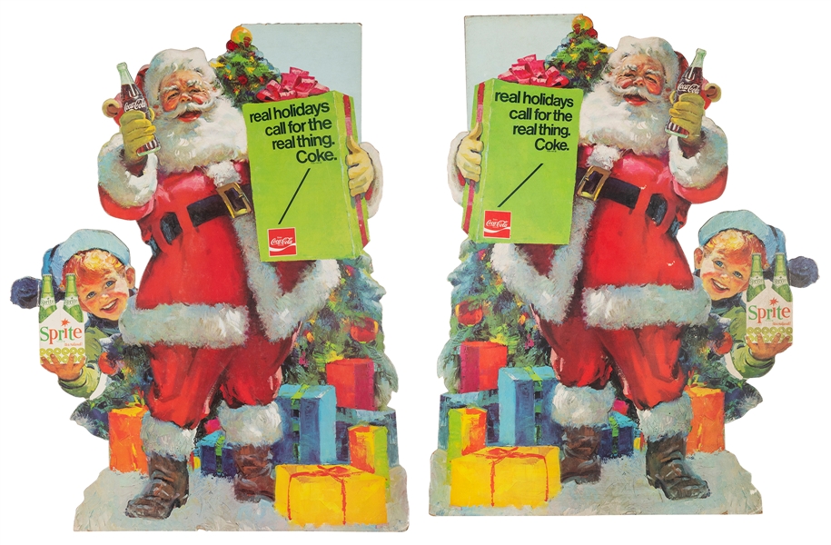  Three Santa Claus cardboard advertising standees. Including...