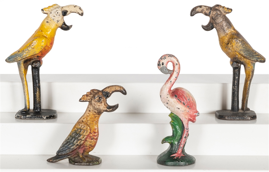  Group of 4 cast-iron figural bottle openers. [Philadelphia:...