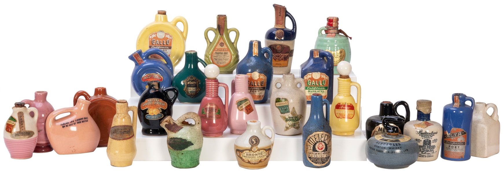  Group of over 30 Miniature Ceramic Liquor Jugs. Many with o...