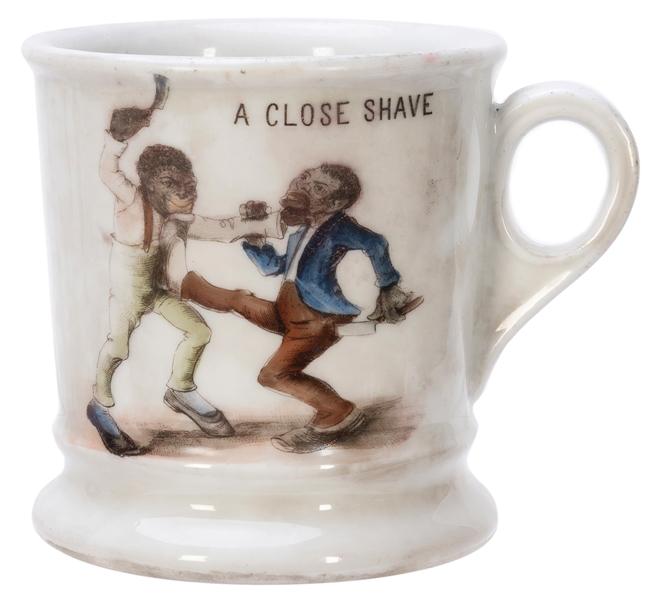  [BLACK AMERICANA]. “A Close Shave” Shaving Mug. Germany: Ro...