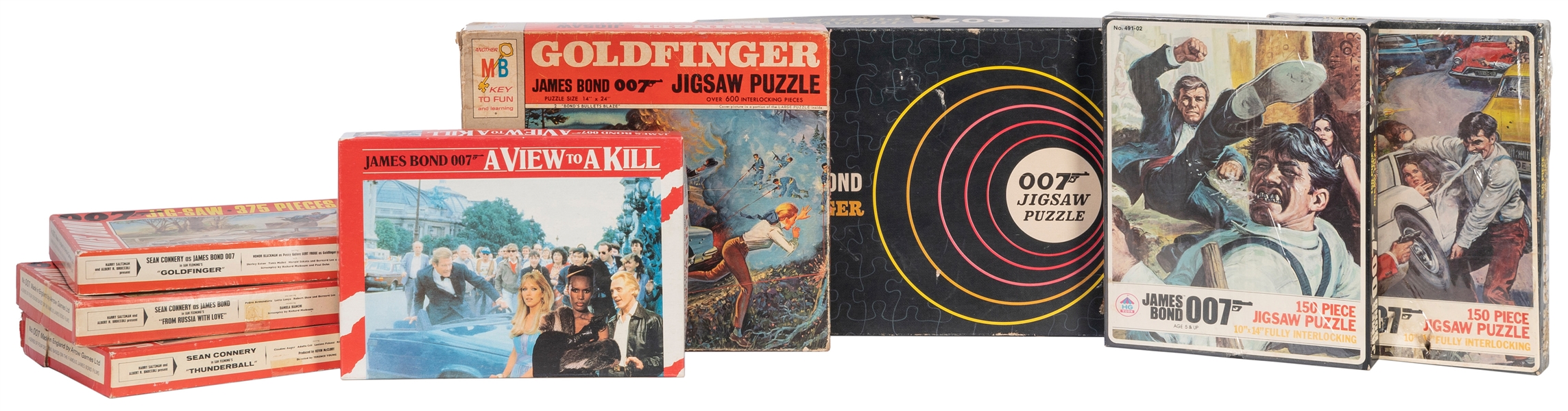  Group of 8 James Bond jigsaw puzzles. [V.p., ca. 1960s-1980...