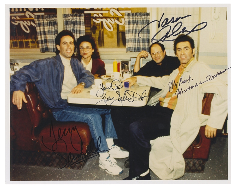  SEINFELD. Cast-signed photo. Hollywood: ca. 1990s. Color ph...