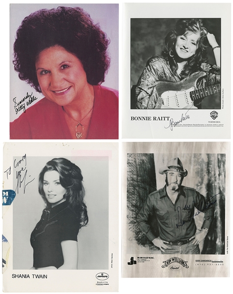  [COUNTRY MUSIC]. Group of four signed photos. [V.p., v.d.]....