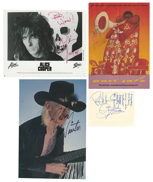  [ROCK PERFORMERS]. Group of four signed items by rock stars...