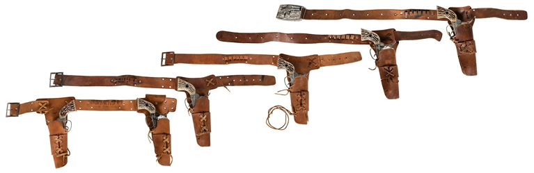  Group of 3 single Shootin’ Shot cowhide holsters with guns,...