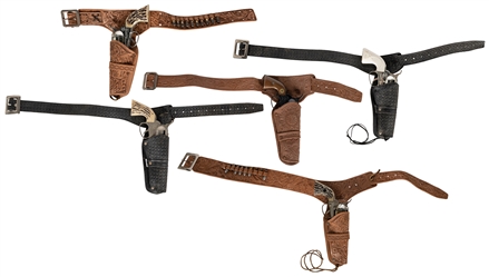  Group of 5 single Fanner 50 plastic holsters with guns. Los...