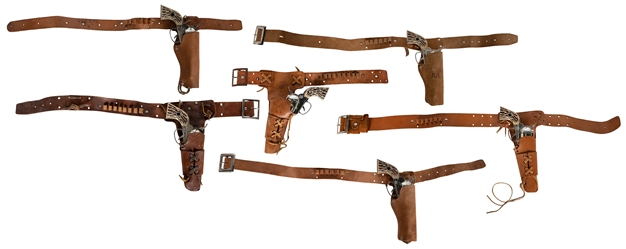  Group of 6 single Shootin’ Shot cowhide holsters and belts....