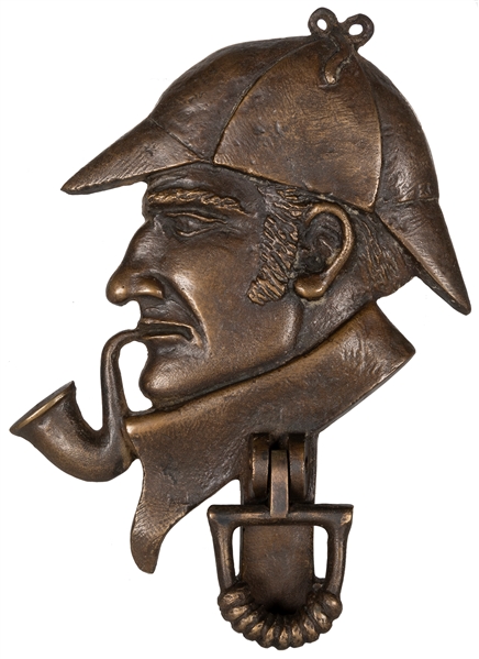  CORDINER, William S. Cast bronze door knocker. Profile of S...