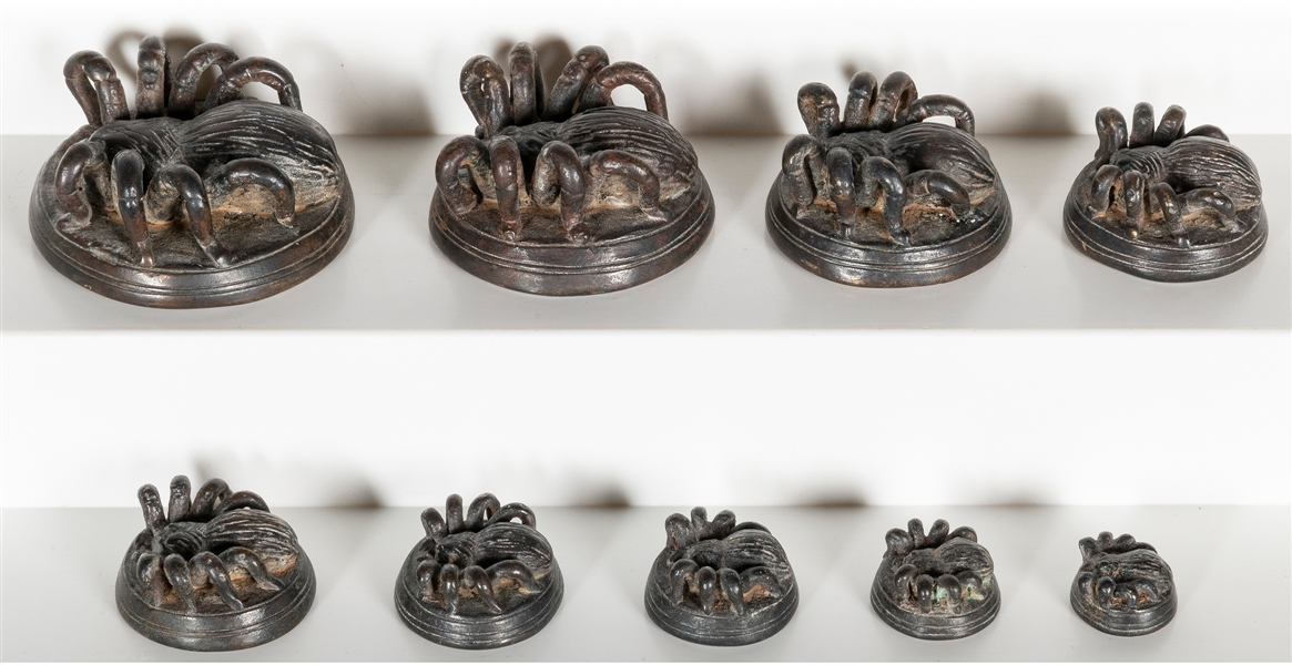  A group of 9 graduated metal tarantula opium weights. [Thai...