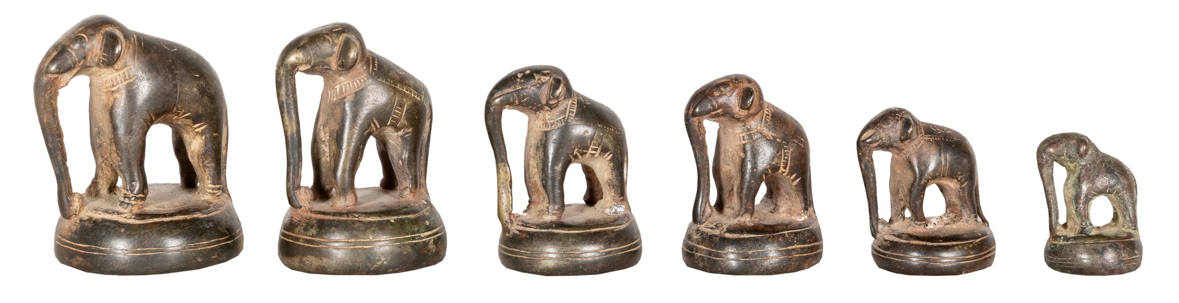  A group of 6 graduated metal elephant opium weights. [Thail...