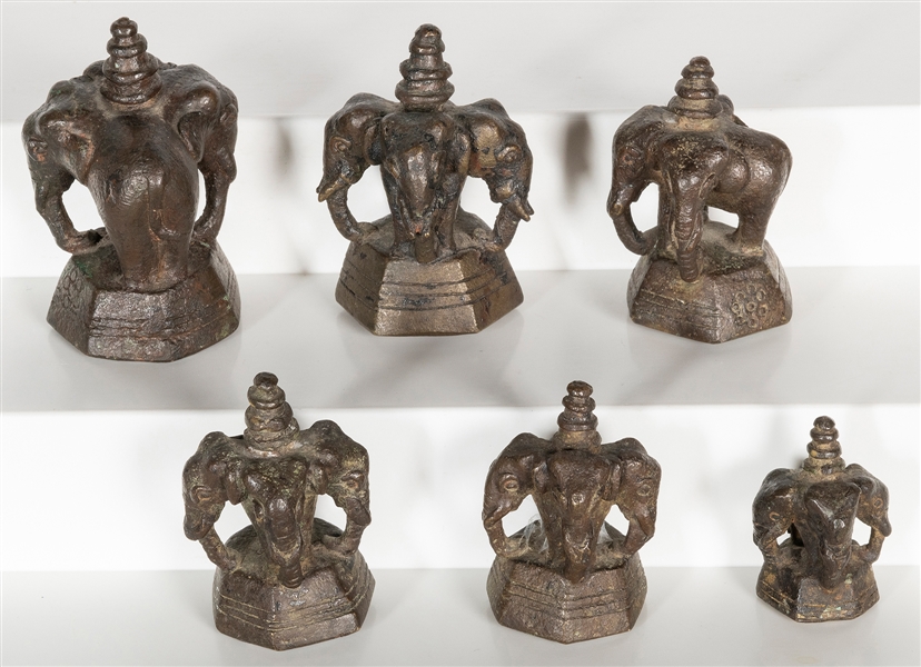  A group of 6 graduated metal three-headed elephant opium we...