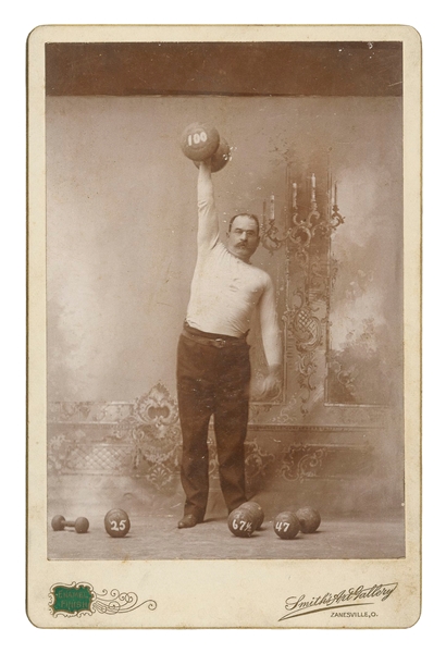  [STRONGMAN]. Cabinet Card Photograph. Zanesville, OH: Smith...