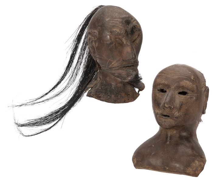  Two Shrunken Heads. Ecuador: 1930s. Two non-human shrunken ...