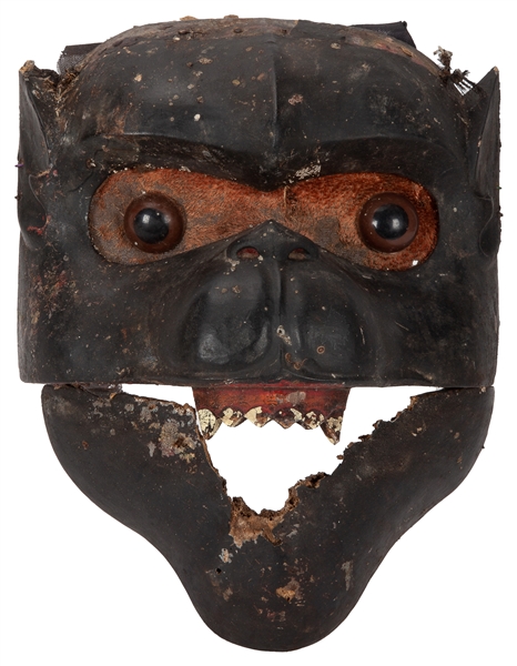  Carved ceremonial painted wooden mask. Southeast Asia [?]. ...