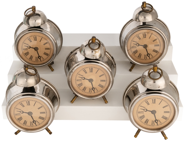  Nest of Clocks. European: 1950s. Six nesting faux alarm clo...