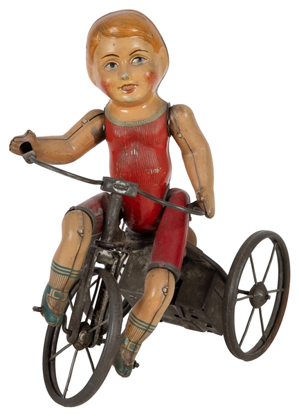  Wind-Up Boy on Tricycle Toy. American: ca. 1920s. Tin litho...