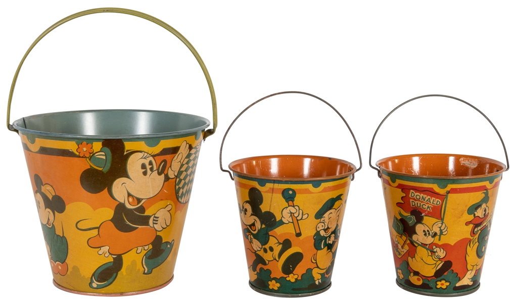  Three Disney Happynak Seaside Sandpails. England: [1930s]. ...