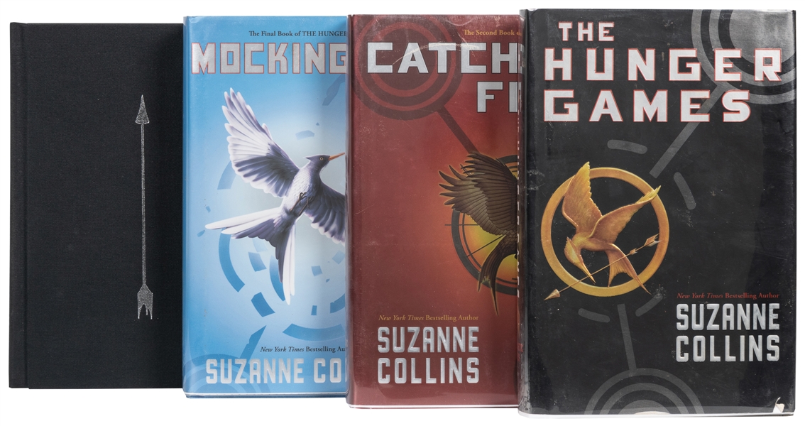  COLLINS, Suzanne. [The Hunger Games trilogy:] The Hunger Ga...