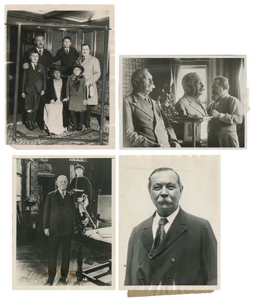  [DOYLE, Arthur Conan, 1859-1930]. A group of 4 press photos...