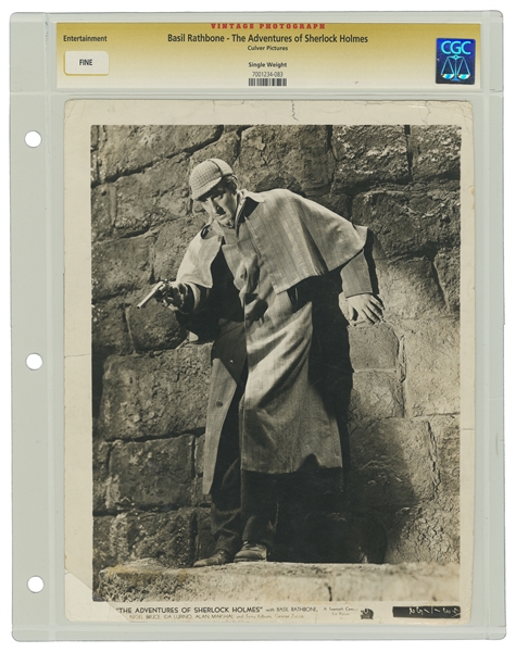  A group of 5 studio stills of Basil Rathbone as Holmes in “...