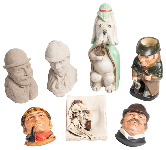  A group of 7 statues or busts of Sherlock Holmes or Dr. Wat...