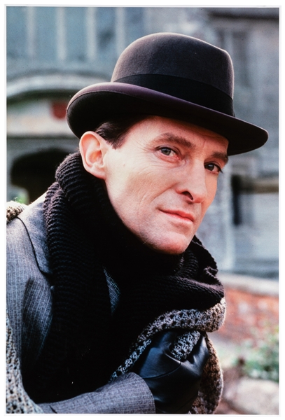  A large photographic portrait print of Jeremy Brett as Sher...