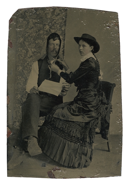  Original Tintype of a Man and Woman Swapping Hats. [Ca. 187...