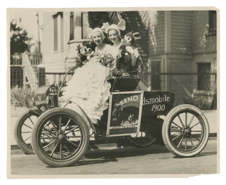  [WALT DISNEY STUDIOS]. [AUTOMOBILES]. Press Photo of Two Wo...