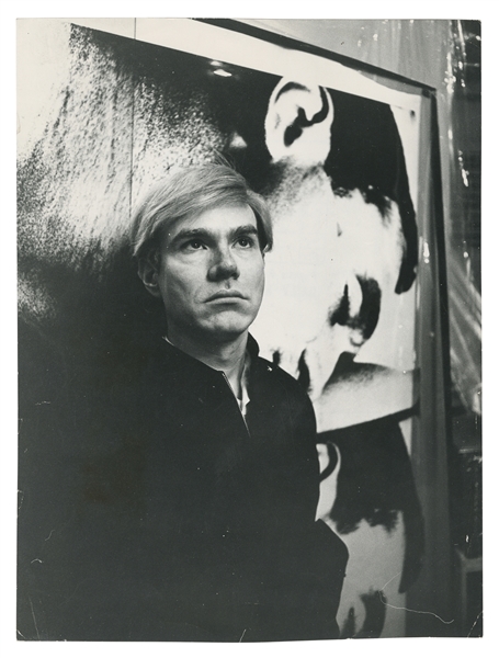  [WARHOL, Andy (1928-1987)]. Two Press Photographs of Warhol...