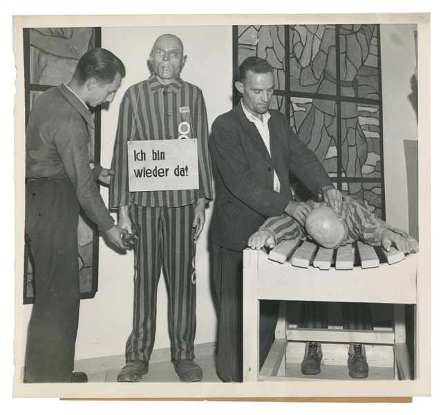  [THE HOLOCAUST]. Press Photo of Two Survivors of the Dachau...