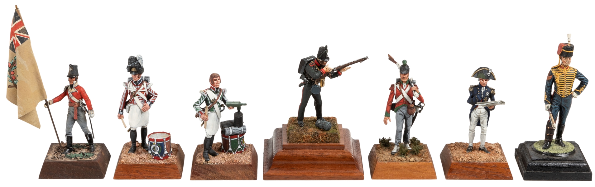  [PAINTED FIGURINES]. Group of 7 Painted Metal Figurines on ...