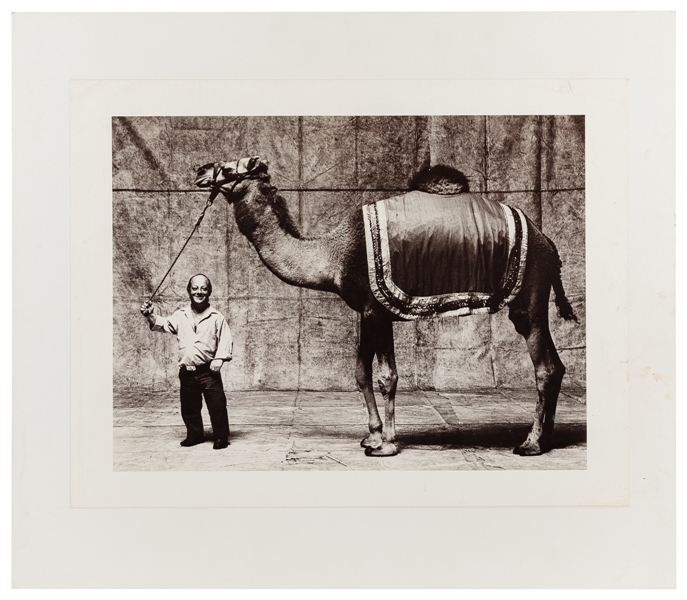  [CIRCUS PHOTOGRAPHY]. Photograph of a little person and cam...