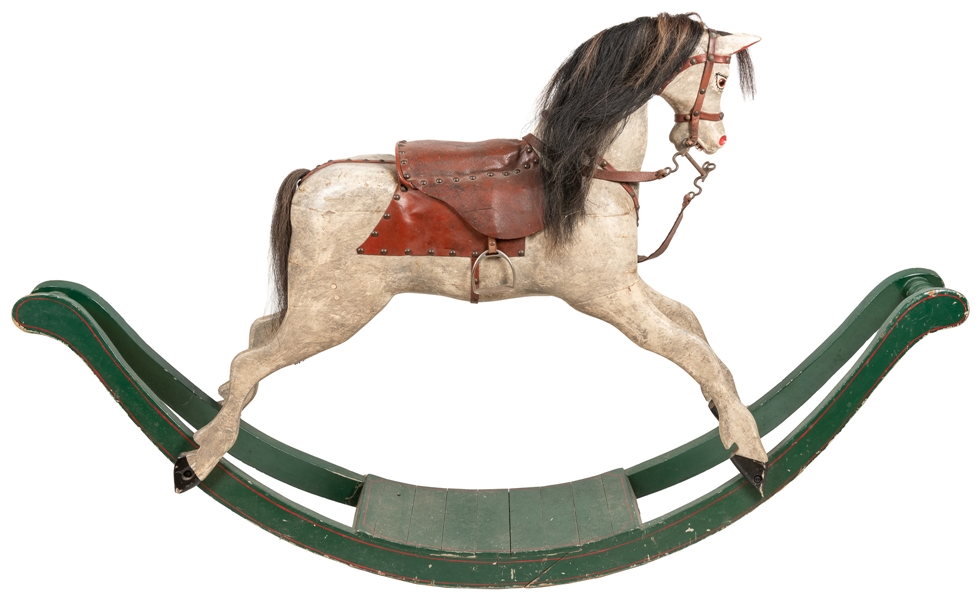  Carousel Rocking Horse. Carved and painted wood, leather sa...