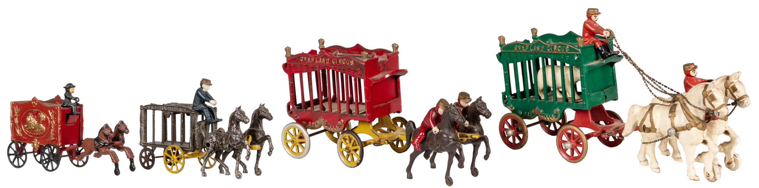  Group of four cast metal circus wagon toys. Circa early 20t...