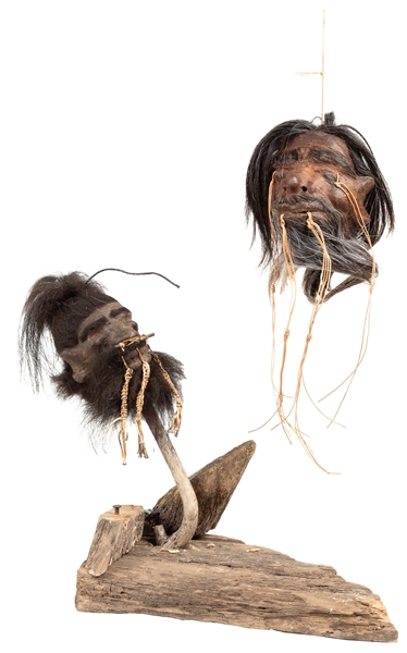  Pair of Faux Shrunken Heads. Vintage pair of shrunken heads...