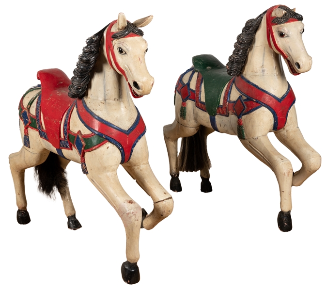  Pair of Carousel Horses. Painted hardwood, in red,...