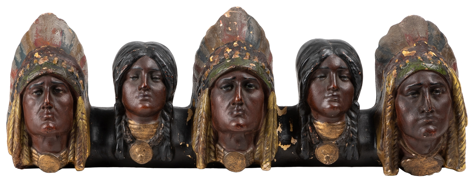  Row of Chalkware Cigar Store Indian Heads. Circa early 20th...