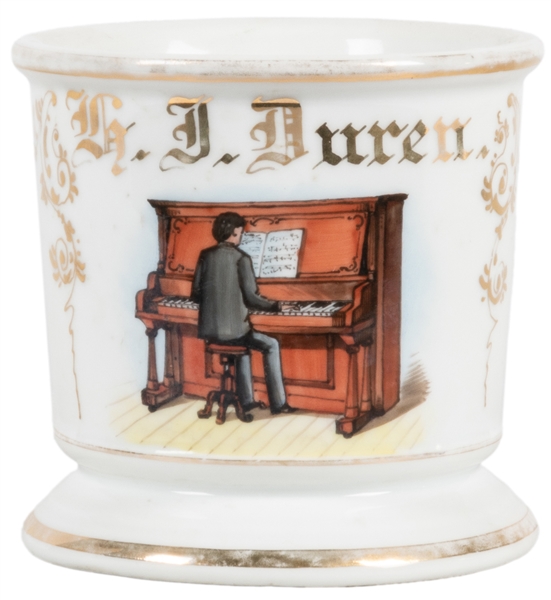  Pianist / Piano Shaving Mug. Gilt painted porcelain, letter...