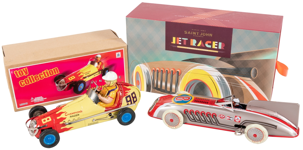  Two Tin Wind-Up Cars. Two contemporary reproductions of vin...