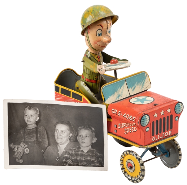  G.I. Joe and his Jouncing Jeep Windup Car and Photograph. N...