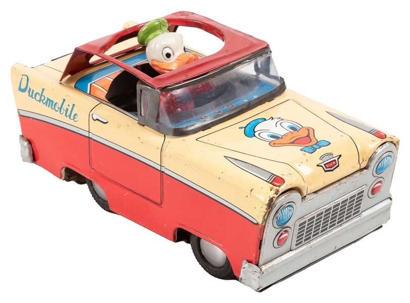  Duckmobile Tin Toy. [Japan: ca. 1950s]. Celluloid tin toy o...