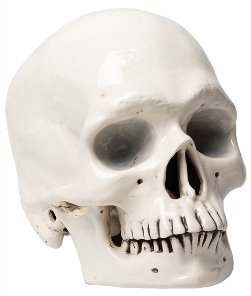  ARTIST UNKNOWN. Ceramic Skull. White high-gloss glazed cera...